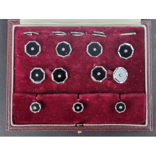 171 - A set of 9ct white gold onyx and diamond cufflinks, studs and matching buttons, by S J Rose & So... 