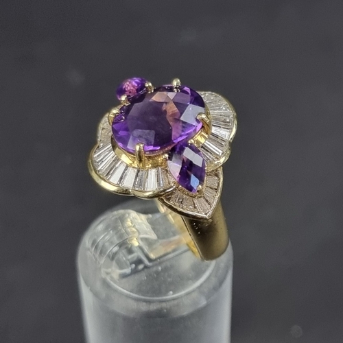 172 - An 18ct gold amethyst and baguette diamond cluster ring, size L 1/2, gross weight 7g.... 