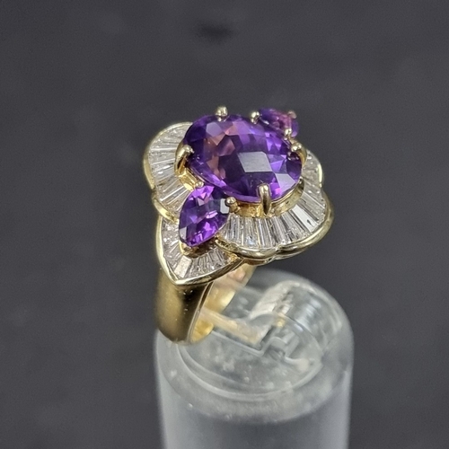 172 - An 18ct gold amethyst and baguette diamond cluster ring, size L 1/2, gross weight 7g.... 