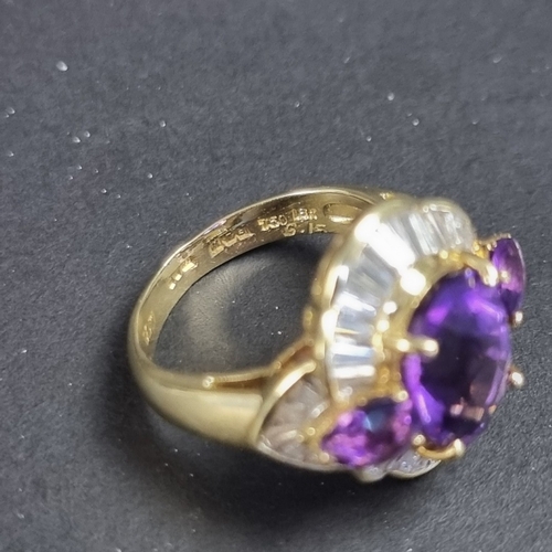 172 - An 18ct gold amethyst and baguette diamond cluster ring, size L 1/2, gross weight 7g.... 