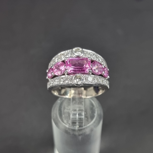 173 - A 18ct white gold pink sapphire and diamond encrusted ring, by Timothy Roe, London 2012, size Q 1/2,... 