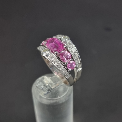 173 - A 18ct white gold pink sapphire and diamond encrusted ring, by Timothy Roe, London 2012, size Q 1/2,... 