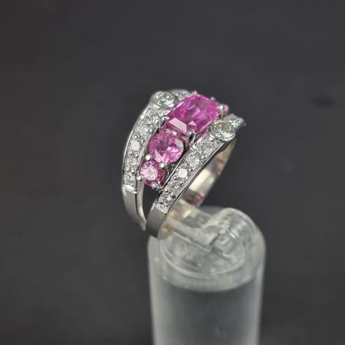 173 - A 18ct white gold pink sapphire and diamond encrusted ring, by Timothy Roe, London 2012, size Q 1/2,... 