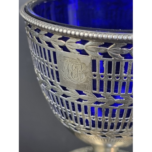 18 - A George III silver swing handled sugar basket, with blue glass lined, by Hester Bateman, London 177... 