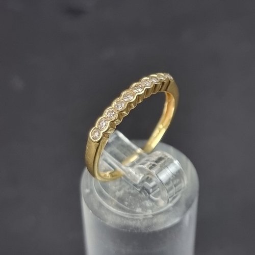 181 - A yellow metal diamond half eternity ring, set with ten diamonds, totalling approximately 0.33ct, si... 