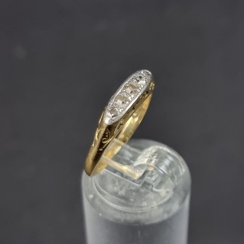 183 - A yellow metal diamond five stone ring, stamped 18ct, size L.