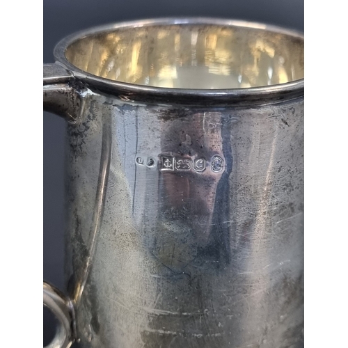 22 - A silver half pint mug, by Deakin & Francis Ltd, Birmingham 1977, 10.5cm high, 171g.... 