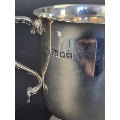 24 - A silver mug, by Goldsmiths & Silversmiths Co Ltd, London 1941, 9.5cm high, 193g.... 