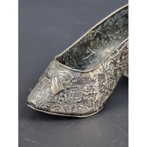 34 - A Dutch white metal novelty slipper, stamped 'Sterling', with Dutch marks, 14cm wide.... 