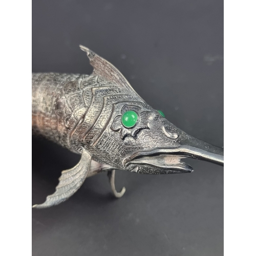 35 - A early 20th century Mexican silver plated novelty articulated swordfish, with green glass eyes, sta... 