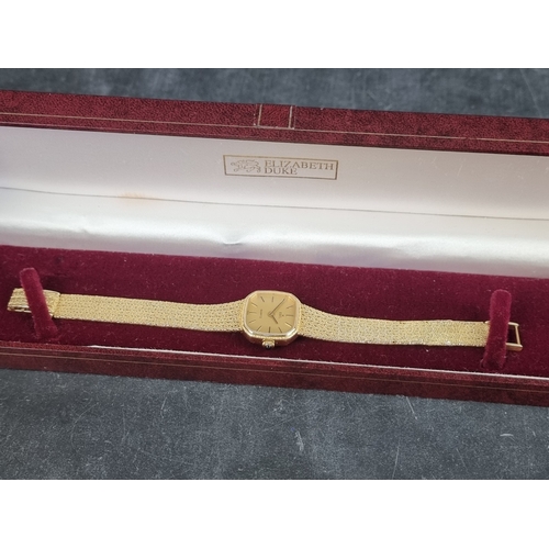 376 - An Ebel 18ct gold quartz ladies wristwatch, 20mm, Ref. 879506, on original integrated 18ct gold brac... 