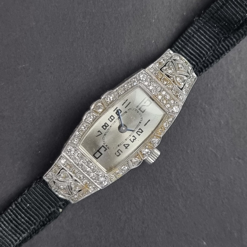 378 - An Art Deco Tissot platinum and diamond encrusted cocktail watch, 16mm, having unsigned silvered dia... 