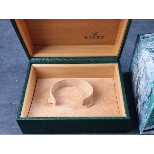 386 - A 2004 Rolex wristwatch box; Ref. 64.00.02, together with interior cushion insert and outer box... 