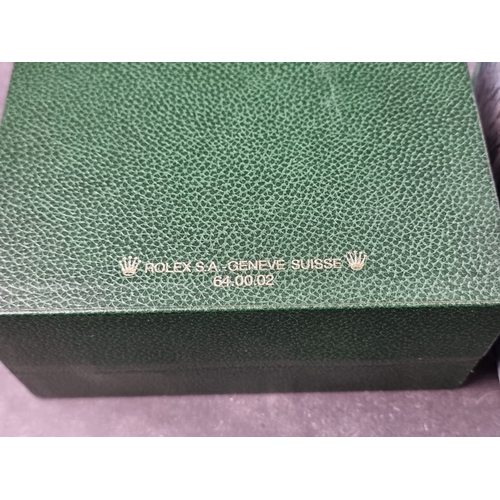 386 - A 2004 Rolex wristwatch box; Ref. 64.00.02, together with interior cushion insert and outer box... 