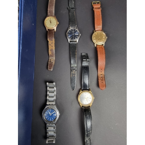 391 - A large group of wristwatches; to include examples by Certina, Seiko, Swatch and Navigator.... 