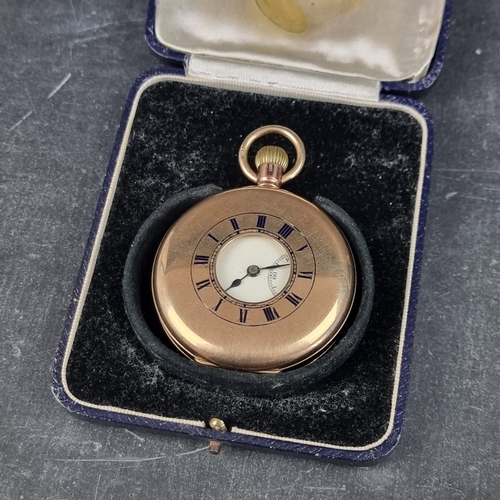 394 - A 9ct gold half hunter stem wind pocket watch, 50mm, having Swiss movement, London 1920, cased.... 