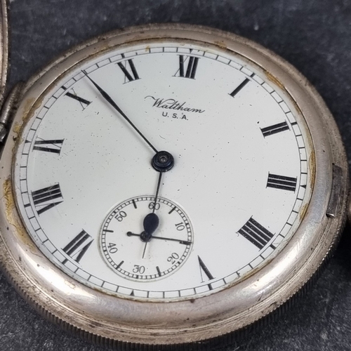 403 - A silver hunter cased stem wind pocket watch, 52mm, signed 'Waltham USA', Birmingham 1918; together ... 