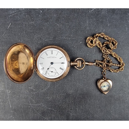 413 - A gold plated hunter stem wind pocket watch, 55mm, signed 'Waltham Watch Co.', with a gold plated wa... 