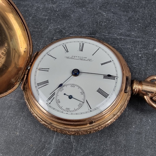 413 - A gold plated hunter stem wind pocket watch, 55mm, signed 'Waltham Watch Co.', with a gold plated wa... 