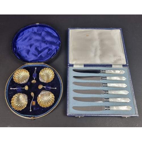 63 - A cased set of four Victorian silver salts and spoons, by Mitchell Bosley & Co, Birmingham 1898,... 