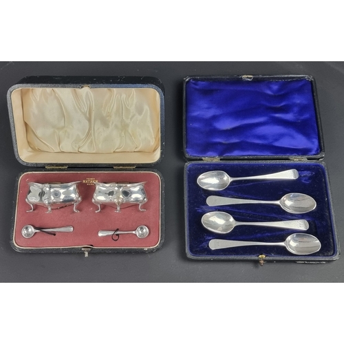 69 - A cased pair of silver salts, by Levesley Brothers, Sheffield 1911, one spoon by different maker; to... 