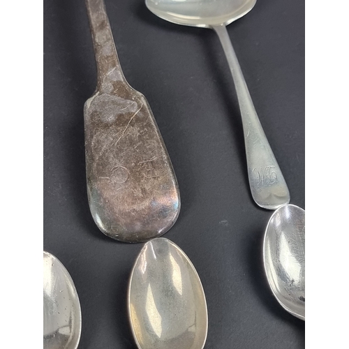 78 - Nine silver spoons; together with a pair of silver sugar tongs, 264g. (10)