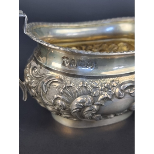 8 - An Edwardian silver sugar bowl and matching milk jug, by Williams Ltd, Birmingham 1903/5, height to ... 