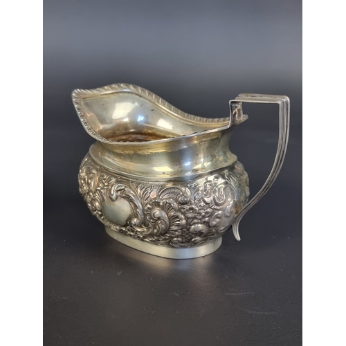 8 - An Edwardian silver sugar bowl and matching milk jug, by Williams Ltd, Birmingham 1903/5, height to ... 