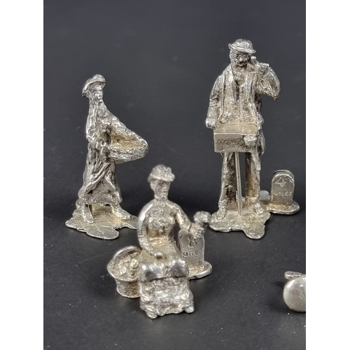 92 - A set of six cast silver 'Cries of London' menu holders, by Thomas Charles Jarvis, London 1992, 263g... 