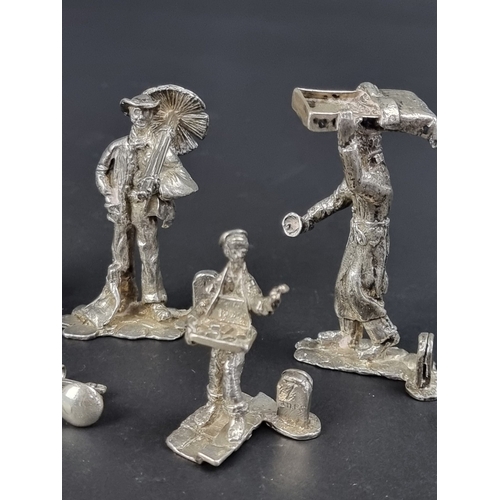 92 - A set of six cast silver 'Cries of London' menu holders, by Thomas Charles Jarvis, London 1992, 263g... 