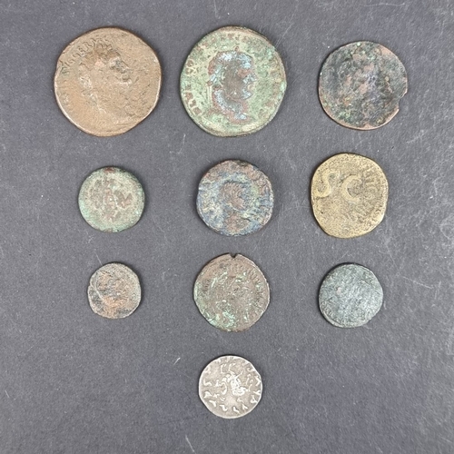 563 - Coins: ten Roman and other ancient coins.