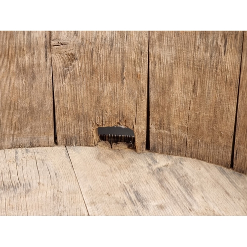 1020 - An antique Scandinavian staved pine twin handled tripod washing vessel, 59cm diameter.... 