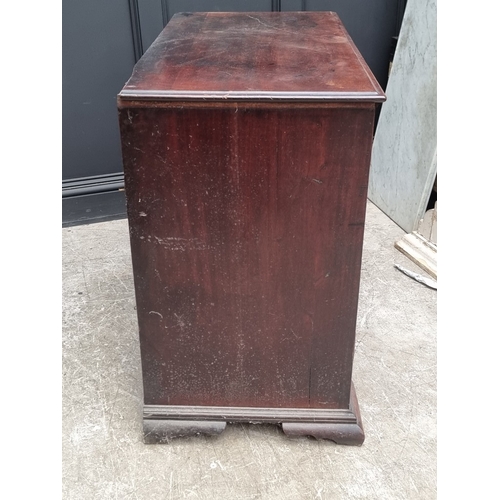 1037 - A George III mahogany chest of three short and three long graduated drawers, (on reduced bracket fee... 
