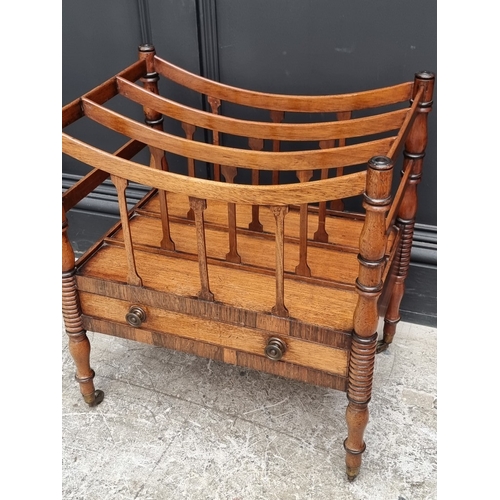 1055 - A George IV mahogany and rosewood crossbanded Canterbury, 48cm wide.