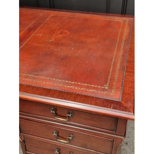 1058 - A large reproduction mahogany pedestal desk, by 'Norfolk Manor Furniture', 183.5cm wide.... 