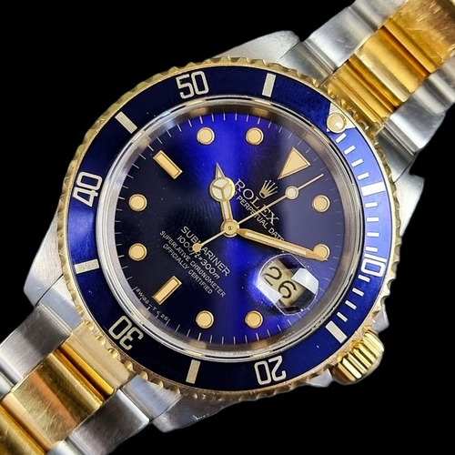 241 - A 1991 Rolex 'Submariner Bluesy' stainless steel and yellow metal automatic wristwatch, 39mm, Ref. 1... 