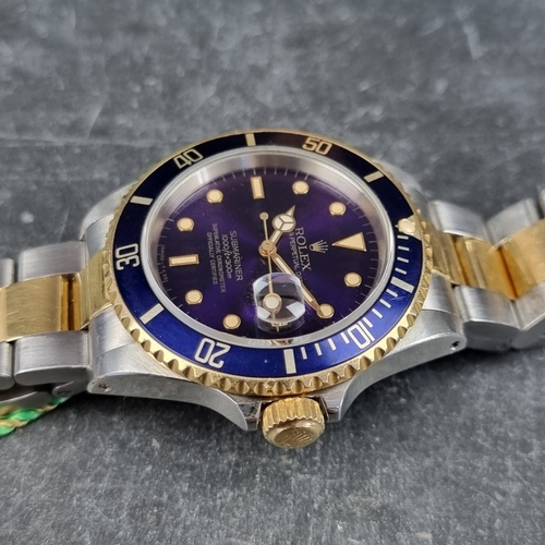241 - A 1991 Rolex 'Submariner Bluesy' stainless steel and yellow metal automatic wristwatch, 39mm, Ref. 1... 