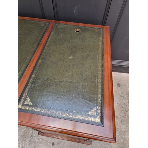 1047 - A large 'Reprodux' mahogany pedestal desk, by Bevan Funnel, 167.5cm wide.