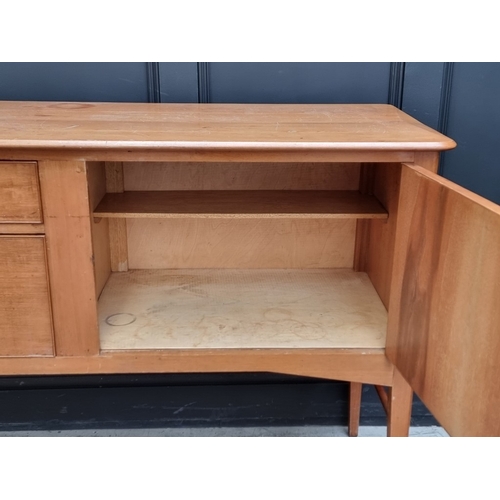 1001 - A 1950s Heal's walnut sideboard, 126.5cm wide, (lacking signed tablet).