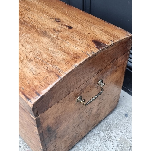 1002 - A small 19th century pine dome top trunk,  42cm high x 59.5cm wide.