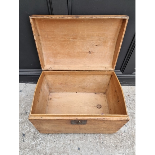 1002 - A small 19th century pine dome top trunk,  42cm high x 59.5cm wide.