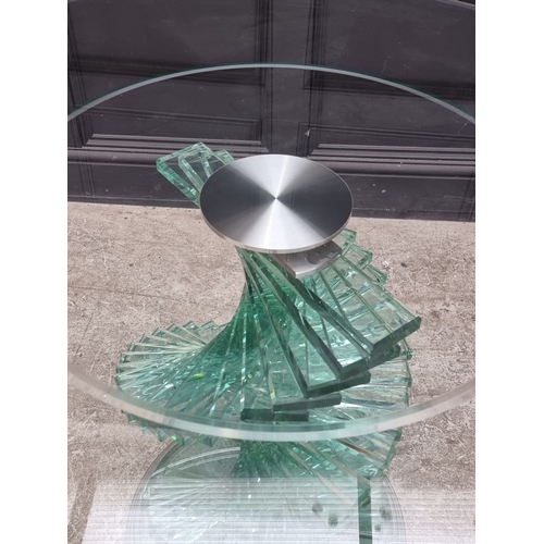 1017 - A contemporary Italian glass circular table, with spiral helix pedestal, in the manner of Danny Lane... 