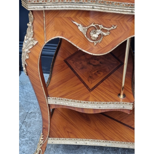 1019 - A Louis XV style tulipwood, marquetry and gilt brass trolley, 91cm wide.