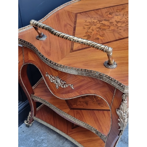 1019 - A Louis XV style tulipwood, marquetry and gilt brass trolley, 91cm wide.