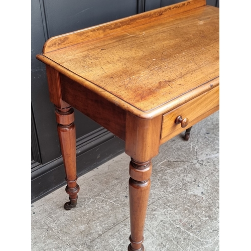 1022 - A Victorian mahogany two drawer side table, 91.5cm wide.