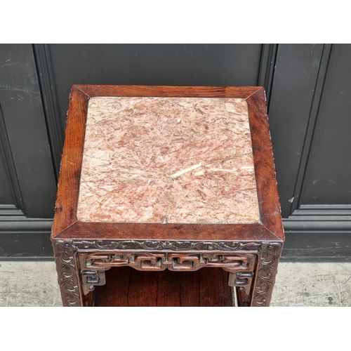 1026 - A Chinese carved hardwood and marble two-tier jardini&egrave;re stand, 80.5cm x 34.5cm, (marble crac... 