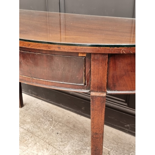 1029 - A 19th century mahogany single drawer demi-lune console table, 122cm wide.