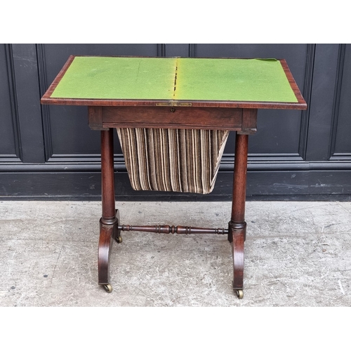 1031 - A Victorian rosewood work table, with fold-over card table surface, 53.5cm wide.