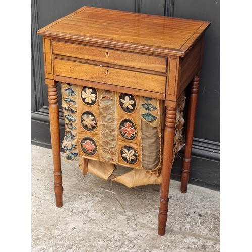 1032 - A Regency mahogany and ebony strung work table, 49.5cm wide.