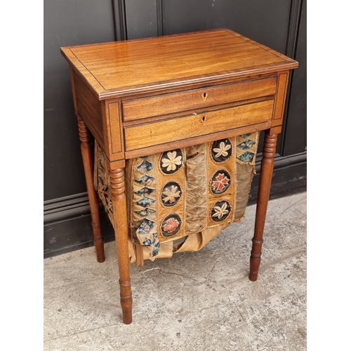 1032 - A Regency mahogany and ebony strung work table, 49.5cm wide.